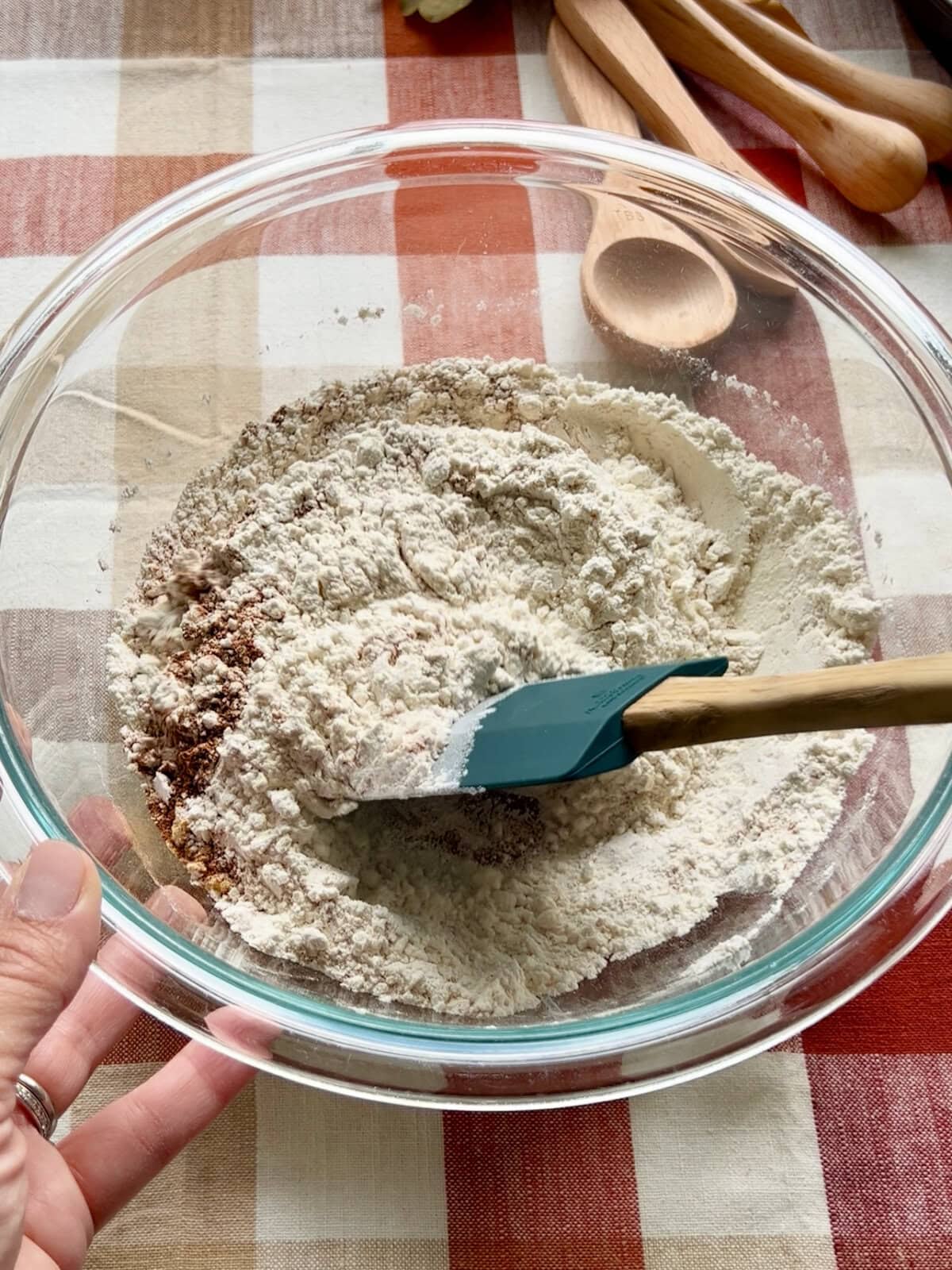 Dry ingredients being stirred together for apple spice cake.