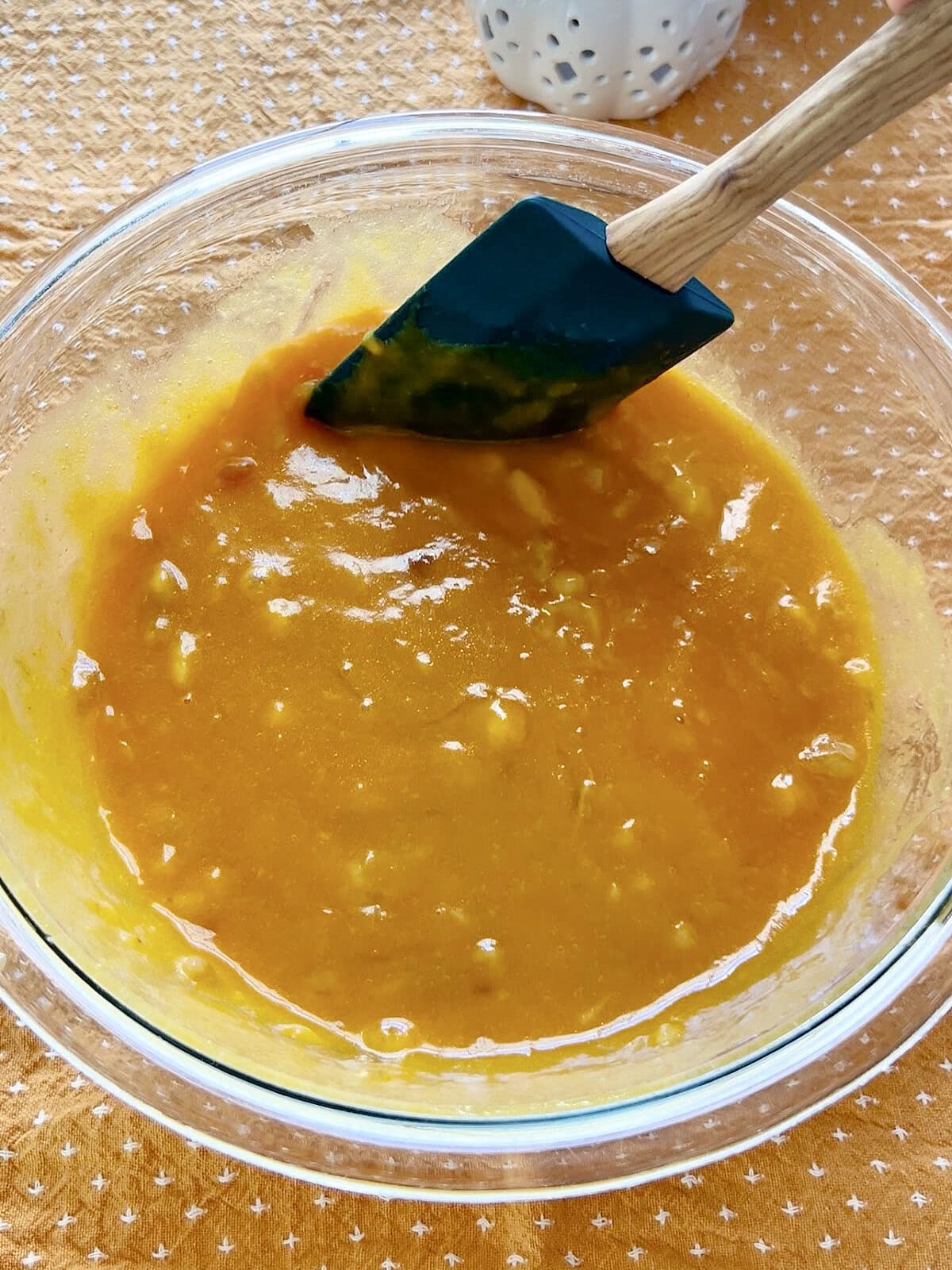 Wet ingredients in a bowl for Pumpkin Banana Bread.