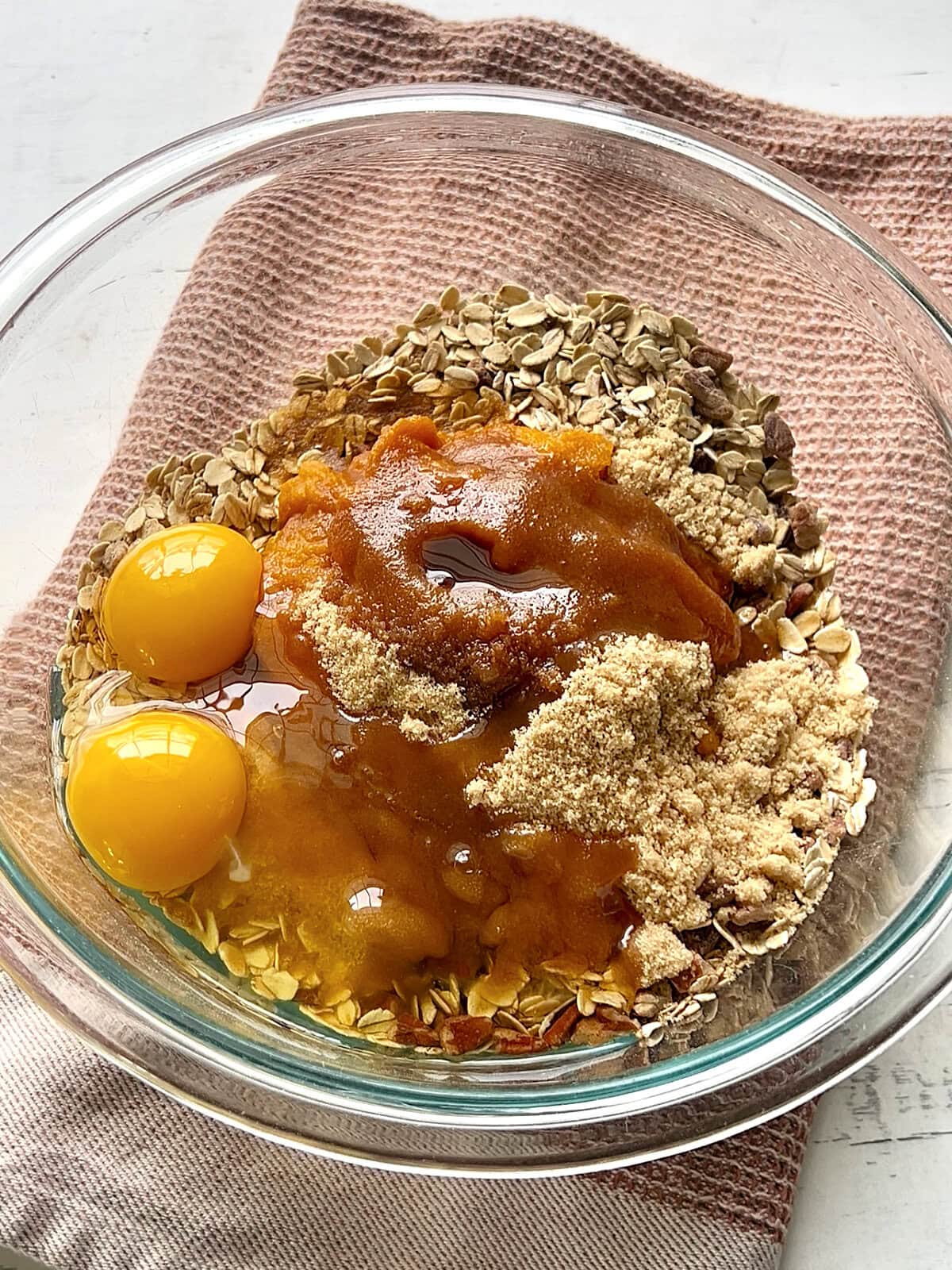 Wet ingredients added to the mixture for Baked Pumpkin Oatmeal.