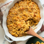 An overhead shot of Pumpkin Mac & Cheese in a white baking dish.