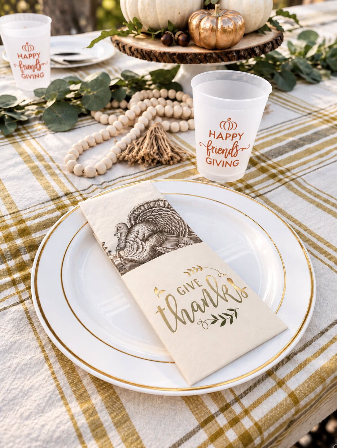 A Thanksgiving table setting to show fall hosting decor.